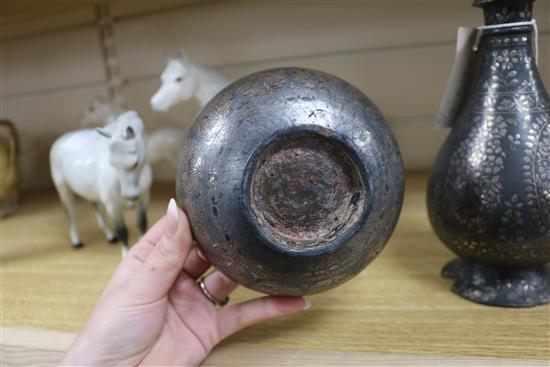 A 19th century Indian Bidri ware bottle vase and a similar bowl vase height 24cm